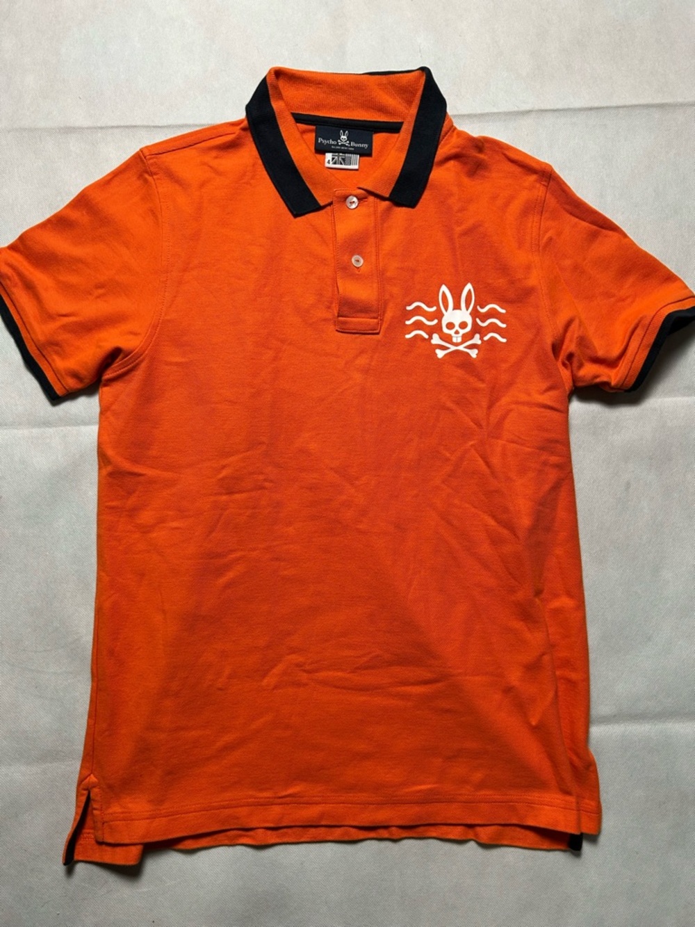 Psycho Bunny orange cotton polo size 4/Small
